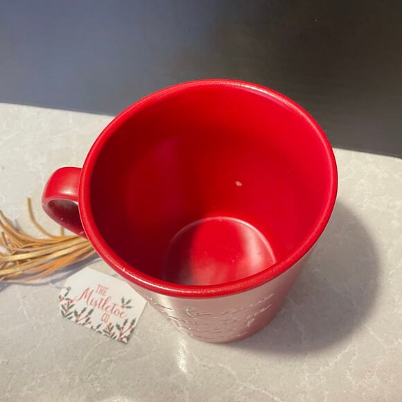 The Mistletoe Company Red large mug cup coffee Spanish writing Christmas cross - Picture 6 of 12